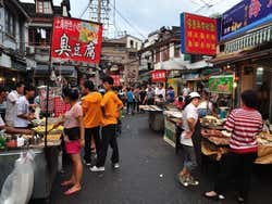 Puestos de comida junto al Jardín Yuyuan