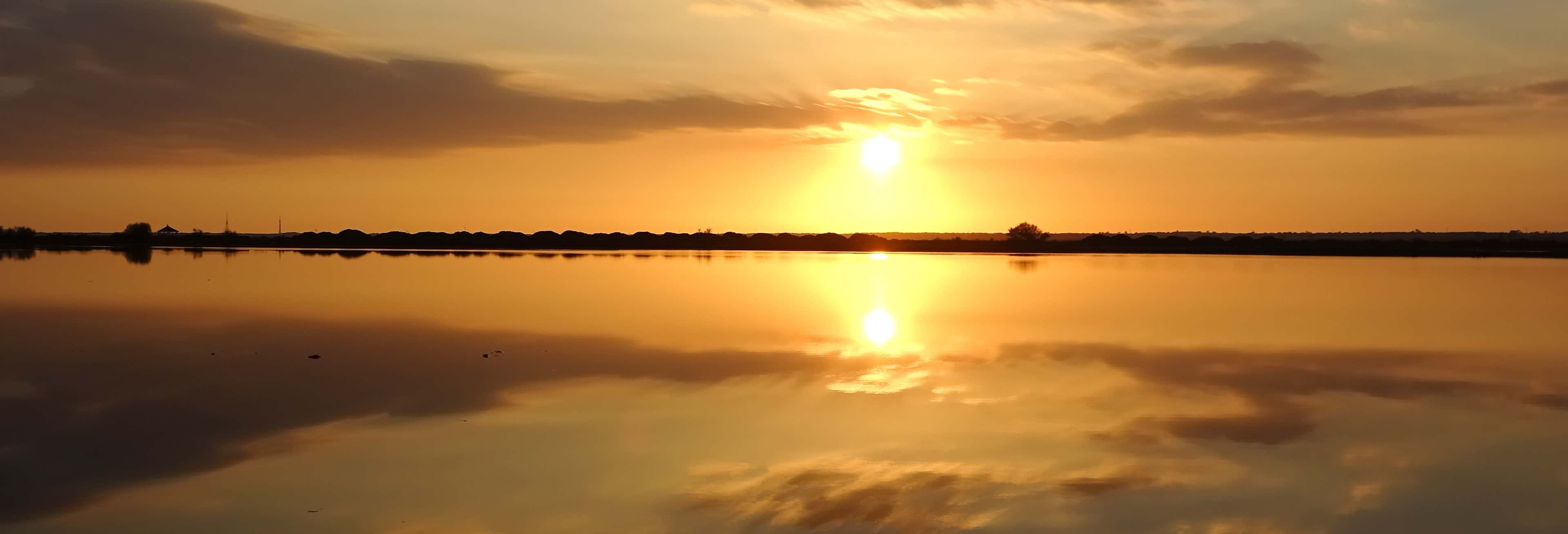 Paseo en barco por las marismas del Odiel al atardecer