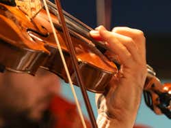 Dettaglio di un musicista del Palazzo di Santa Chiara